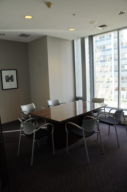 Meeting room with large windows, city view, and modern chairs. - 1275 Alberni Street, Vancouver Downtown