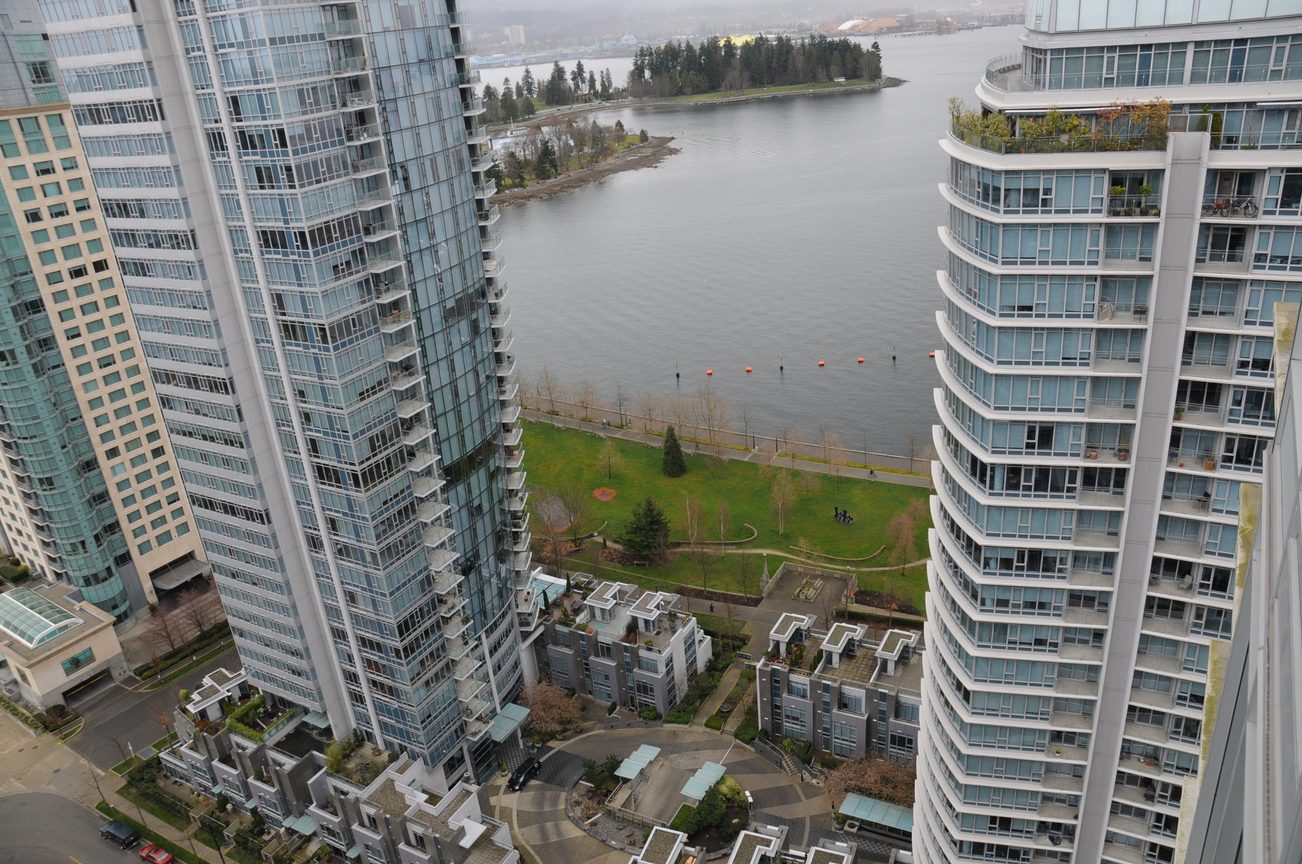 Bright living room with city view and waterfront access. - 2901 - 1205 West Hastings Street, Vancouver Downtown