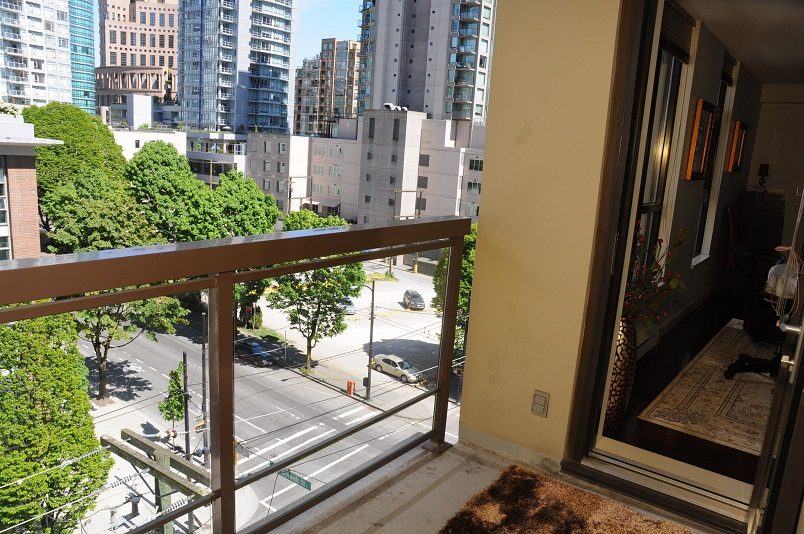 Balcony with city view and modern furnishings. - 705 - 538 Smithe, Vancouver Downtown