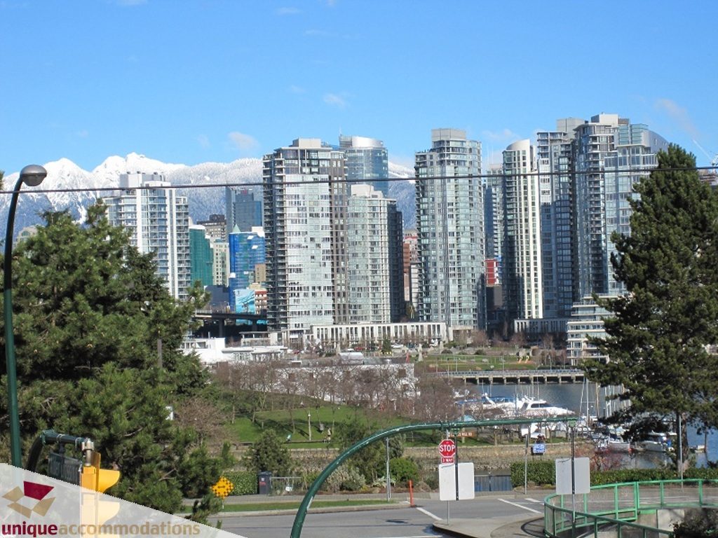 Furnished 2-bedroom condo with stunning city view and modern furnishings. - 6-1250 West 6th Ave, Vancouver West Side