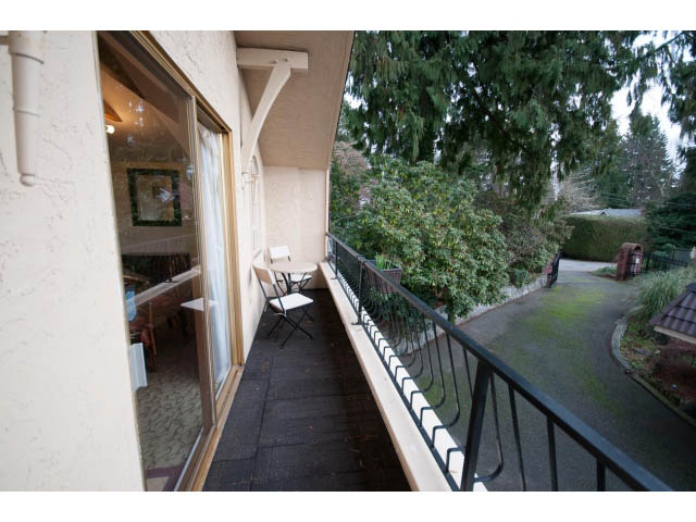 Furnished balcony with greenery and pathway leading to garden. - Cottage - Sinclair Street, West Vancouver