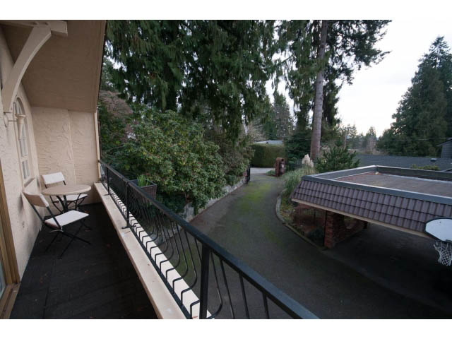 Furnished balcony with a view of trees and rooftops. - Cottage - Sinclair Street, West Vancouver