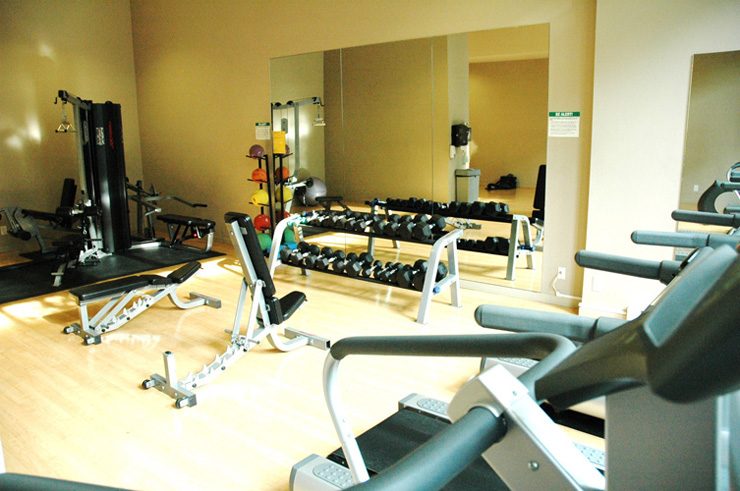 Furnished gym with weight machines and mirrors, hardwood floors. - 2605 - 928 Homer Street, Vancouver Downtown