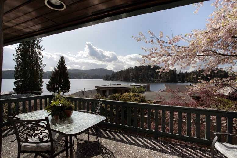 Furnished patio with cherry blossoms and lake view. - 2758 Panorama Drive, North Vancouver