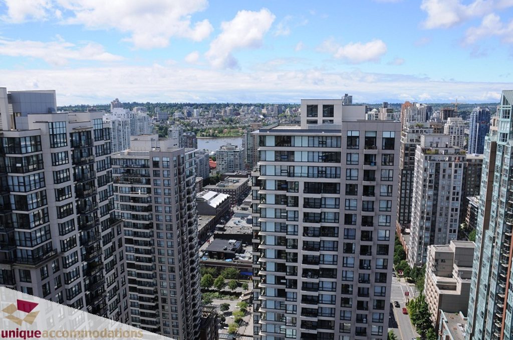 Furnished 2-bedroom + den with stunning city view and modern architecture. - 3401 - 888 Homer Street, Vancouver Downtown