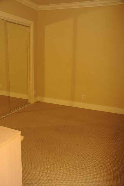 Empty den with carpeted floor and sliding glass door. - 4069 West 37th Ave, Vancouver West Side