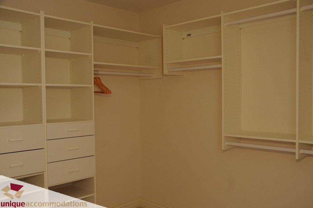 Spacious walk-in closet with ample shelving and hanging space. - 4139 Citadel Court, North Vancouver