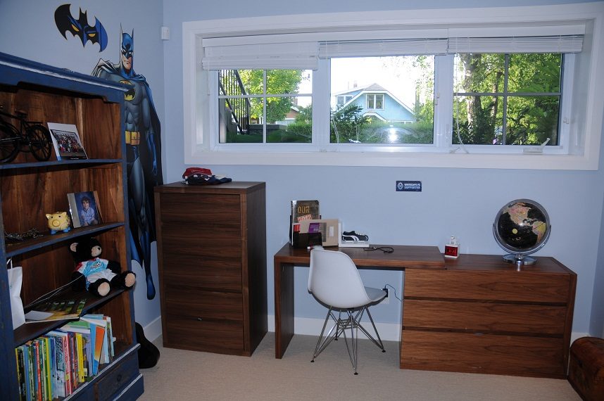 Bright study with wooden desk, Batman mural, and large windows. - 4104 West 12th Avenue, Vancouver West Side