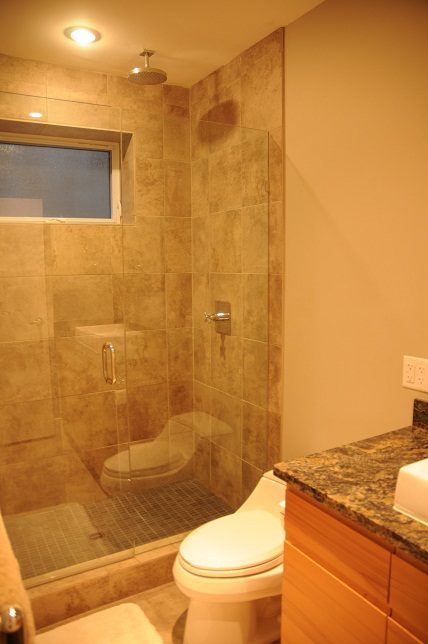 Bathroom with granite countertops and a walk-in shower. - 4104 West 12th Avenue, Vancouver West Side