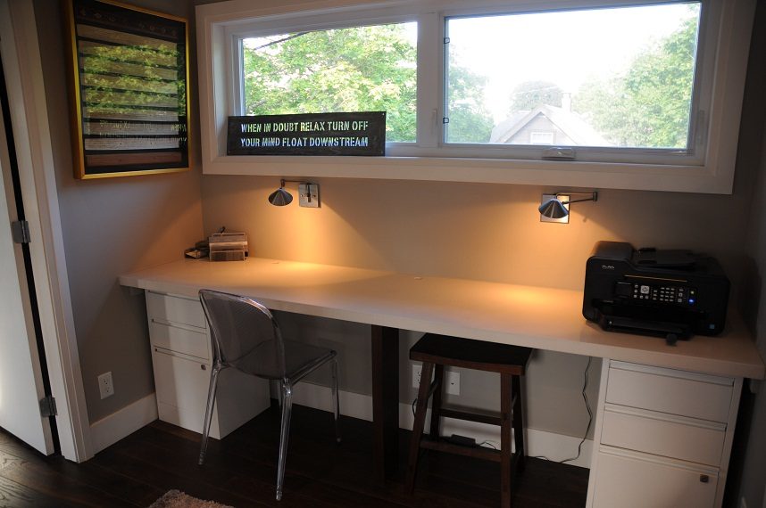 Bright home office with white countertop, desk lamp, and window view. - 4104 West 12th Avenue, Vancouver West Side