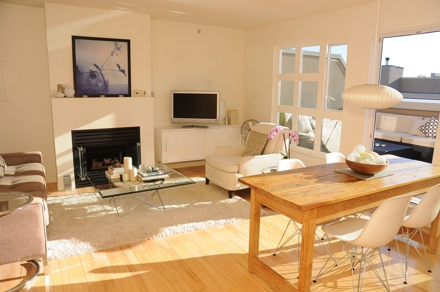 Bright living room with hardwood floors, modern furniture, and a large window. - 411- 2161 West 12th Avenue, Vancouver West Side