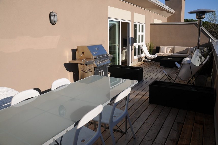 Furnished patio with glass table, outdoor grill, and modern seating. - 411- 2161 West 12th Avenue, Vancouver West Side