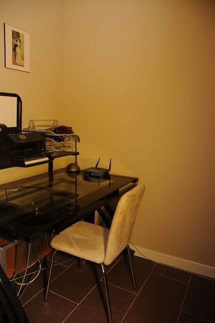 Small, cozy office nook with glass desk, printer, and chair. - 506 - 618 Abbott Street, Vancouver Downtown
