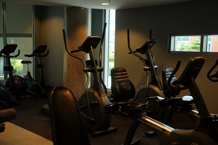 Fitness room with cardio equipment and large windows. - 506 - 618 Abbott Street, Vancouver Downtown