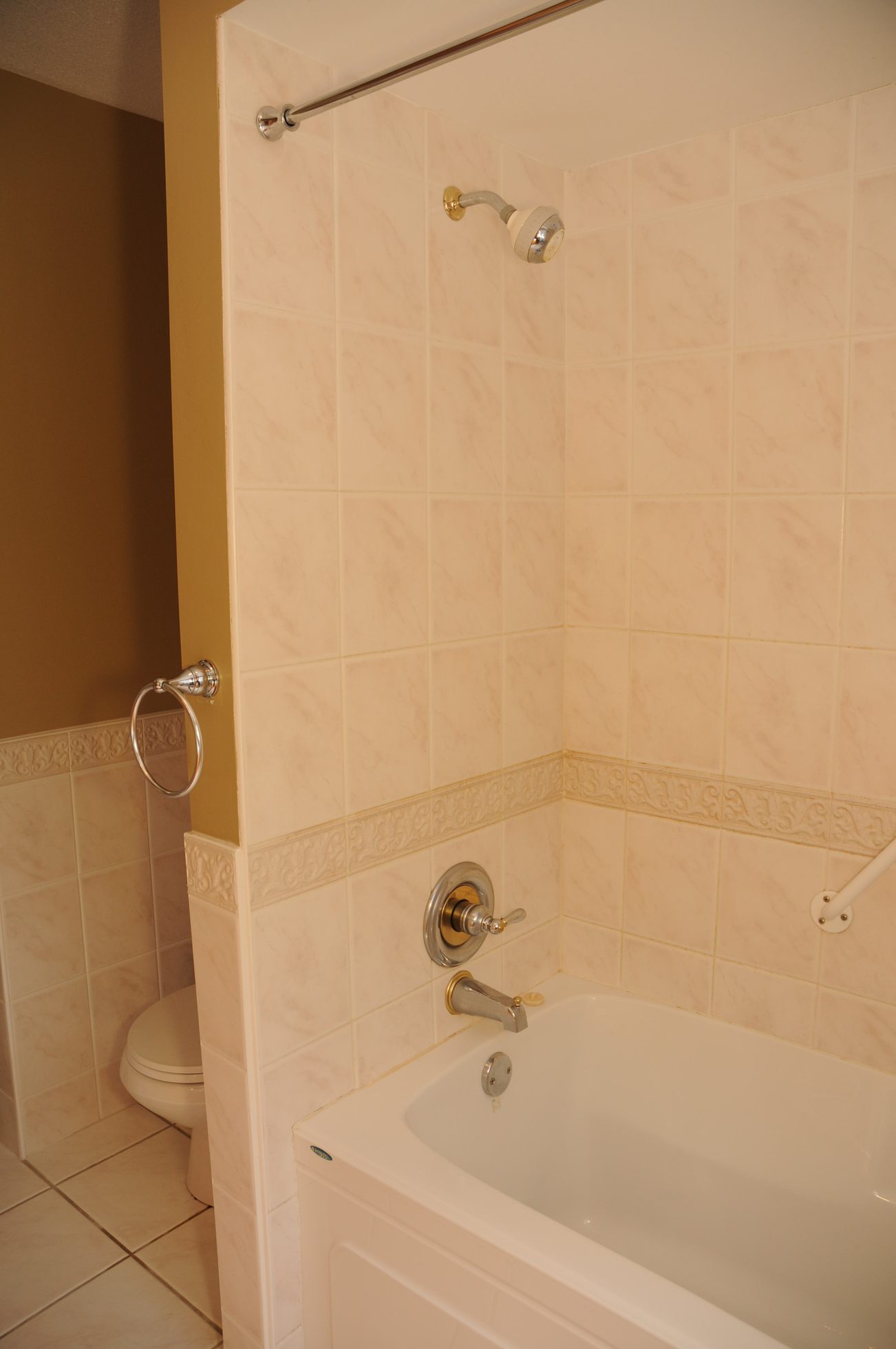 Bathroom with tiled walls, shower, and bathtub. - 5591 Huckleberry Place, North Vancouver