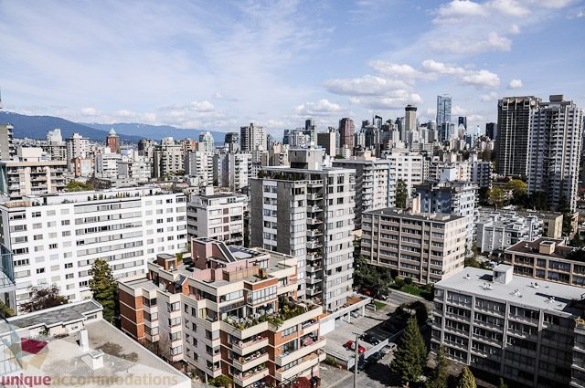 Furnished 1-bedroom condo with city view, modern furnishings, and large windows. - 1802- 2055 Pendrell, Vancouver Downtown