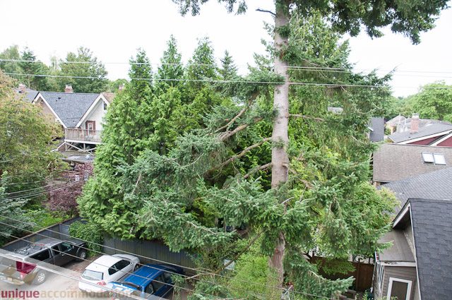 Furnished living room with city view and large windows. - 402- 2680 West 4th Ave PH2, Vancouver West Side