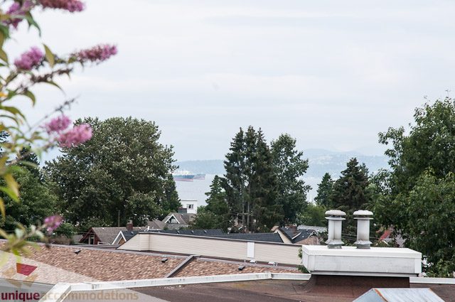 Bright living room with city view and rooftop access. - 402- 2680 West 4th Ave PH2, Vancouver West Side