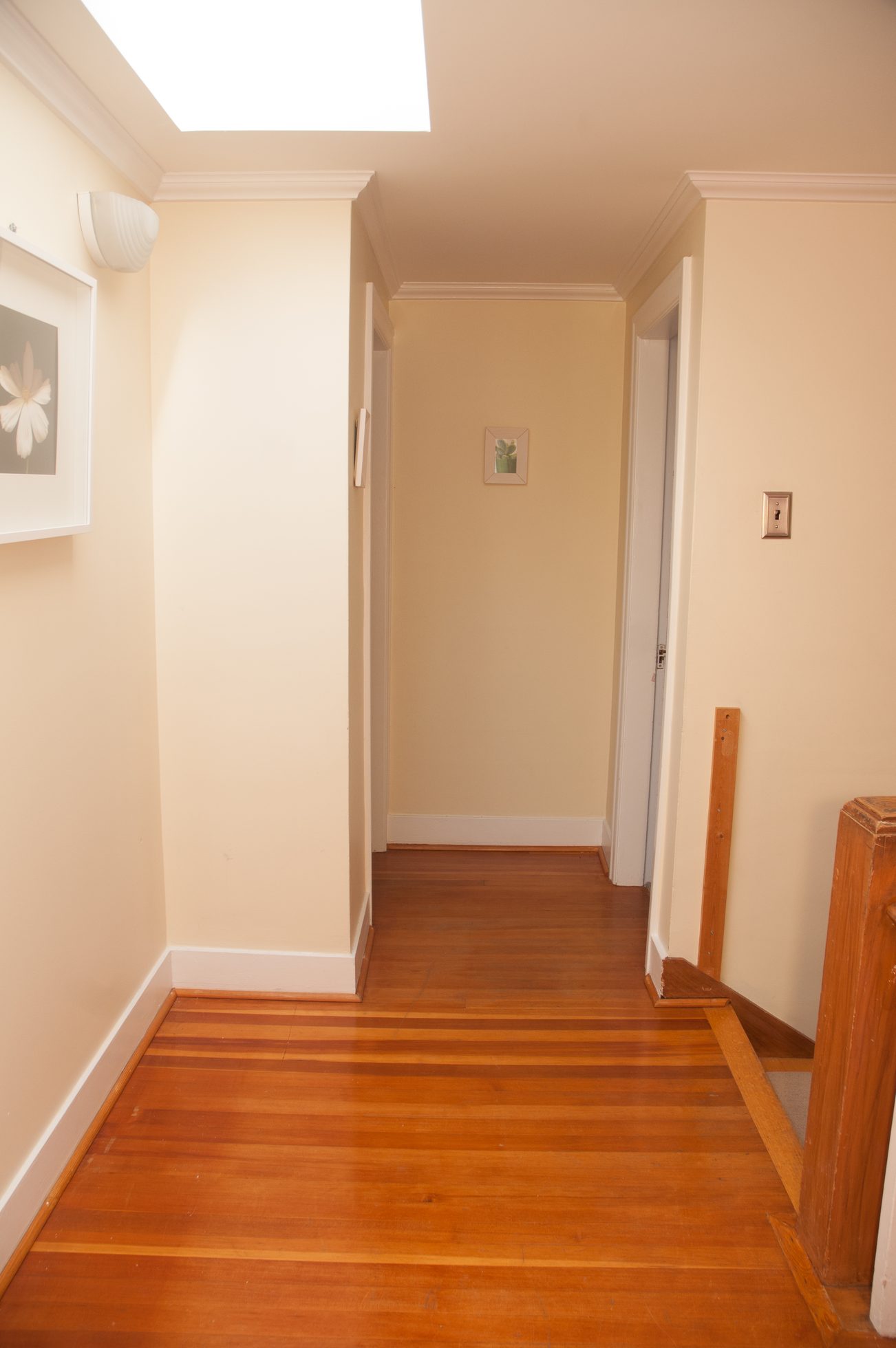 Bright hallway with hardwood floors and a skylight. - 3249 West 36th Ave, Vancouver West Side