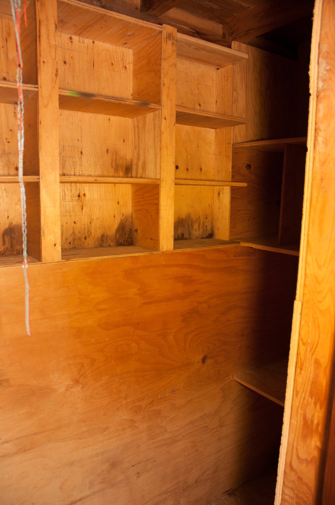 Empty wooden shelving unit in a 5-bedroom house, ready for furniture. - 3249 West 36th Ave, Vancouver West Side