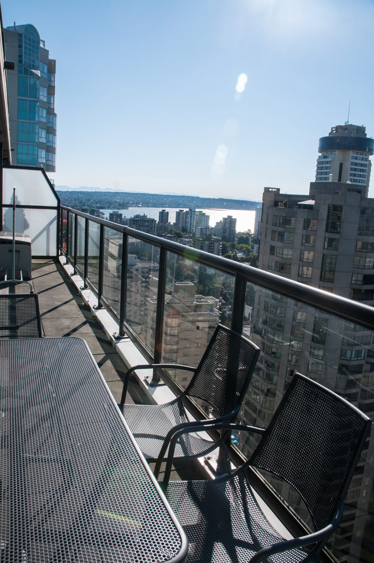 Bright balcony with modern furniture and stunning city view. - 3201 - 1331 Alberni, Vancouver Downtown
