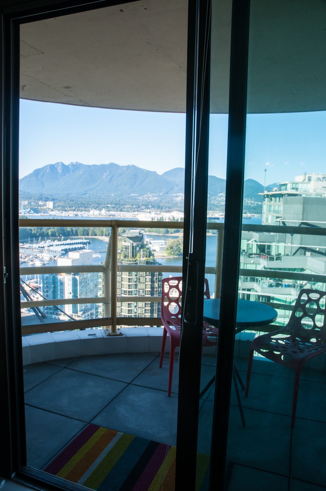 Furnished balcony with city view and modern chairs. - 3201 - 1331 Alberni, Vancouver Downtown