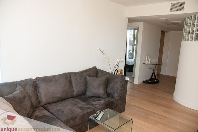 Furnished living room with hardwood floors and modern furniture. - 604-1000 Beach Avenue, Vancouver Downtown
