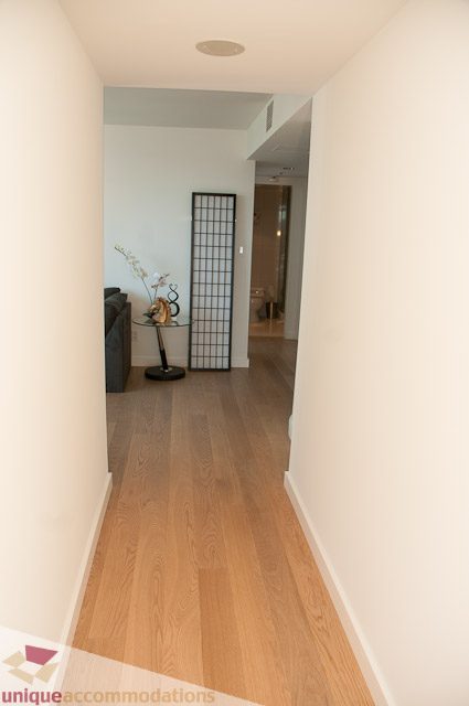 Furnished hallway with hardwood floors and a decorative screen. - 604-1000 Beach Avenue, Vancouver Downtown