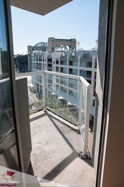 Furnished balcony with city view and modern railings. - 604-1000 Beach Avenue, Vancouver Downtown