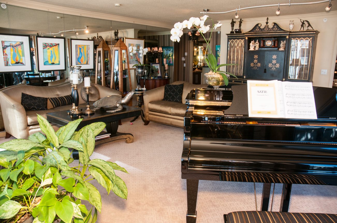 Furnished living room with piano, art, and plush seating. - 1501 - 1238 Seymour Street, Vancouver Downtown