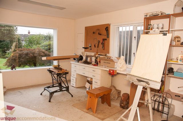 Creative studio with large windows, tools, and easels. - 4559 W. 3rd Ave, Vancouver West Side