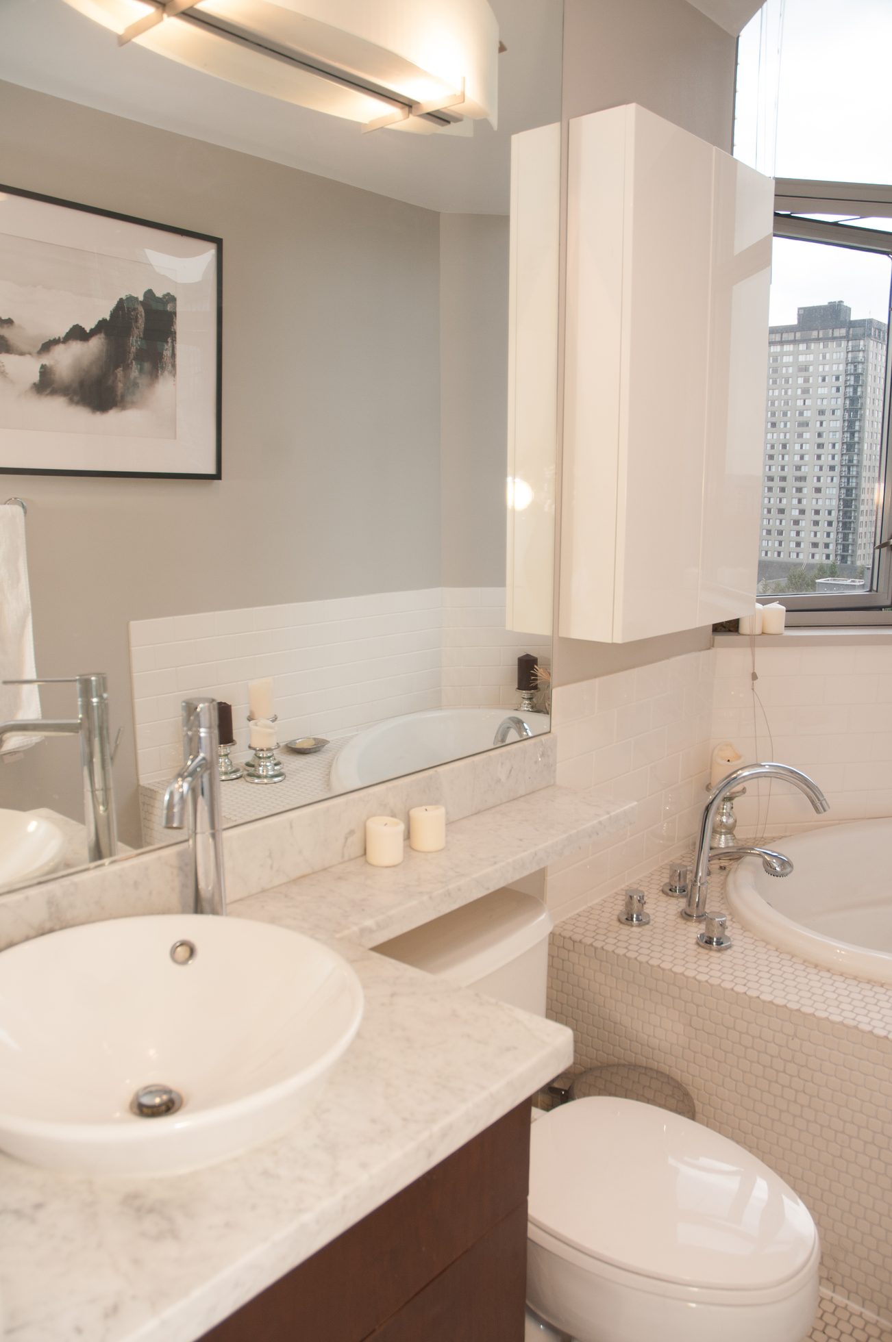 Bright bathroom with marble countertop and city view. - 1406-1050 Smithe, Vancouver Downtown