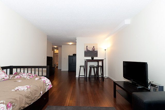 Furnished 2-bedroom condo with hardwood floors and a cozy living area. - 106-827 West 16th Street, North Vancouver