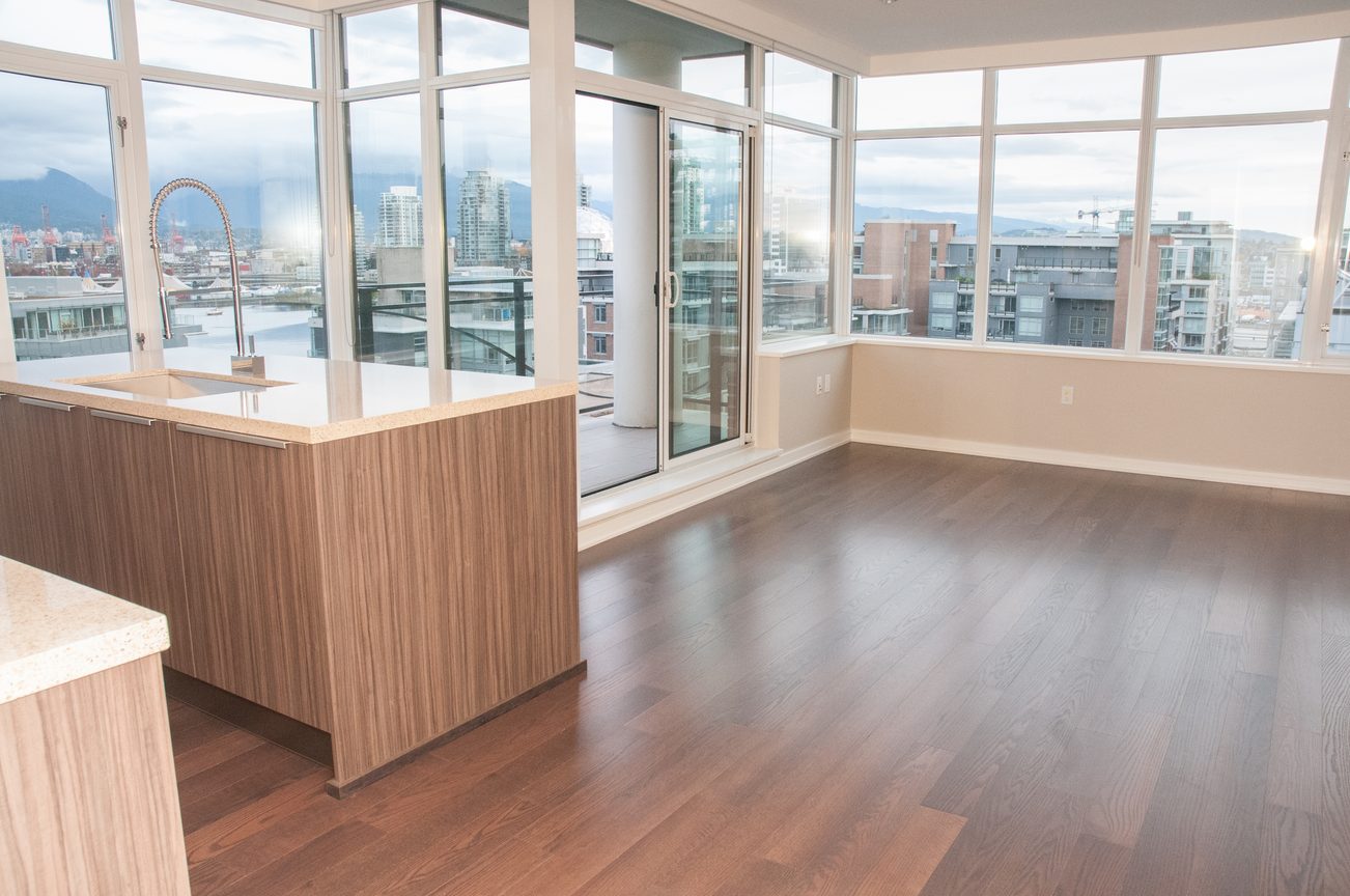 Bright kitchen with hardwood floors and city view. - 1010-181 West 1st Avenue, Vancouver West Side