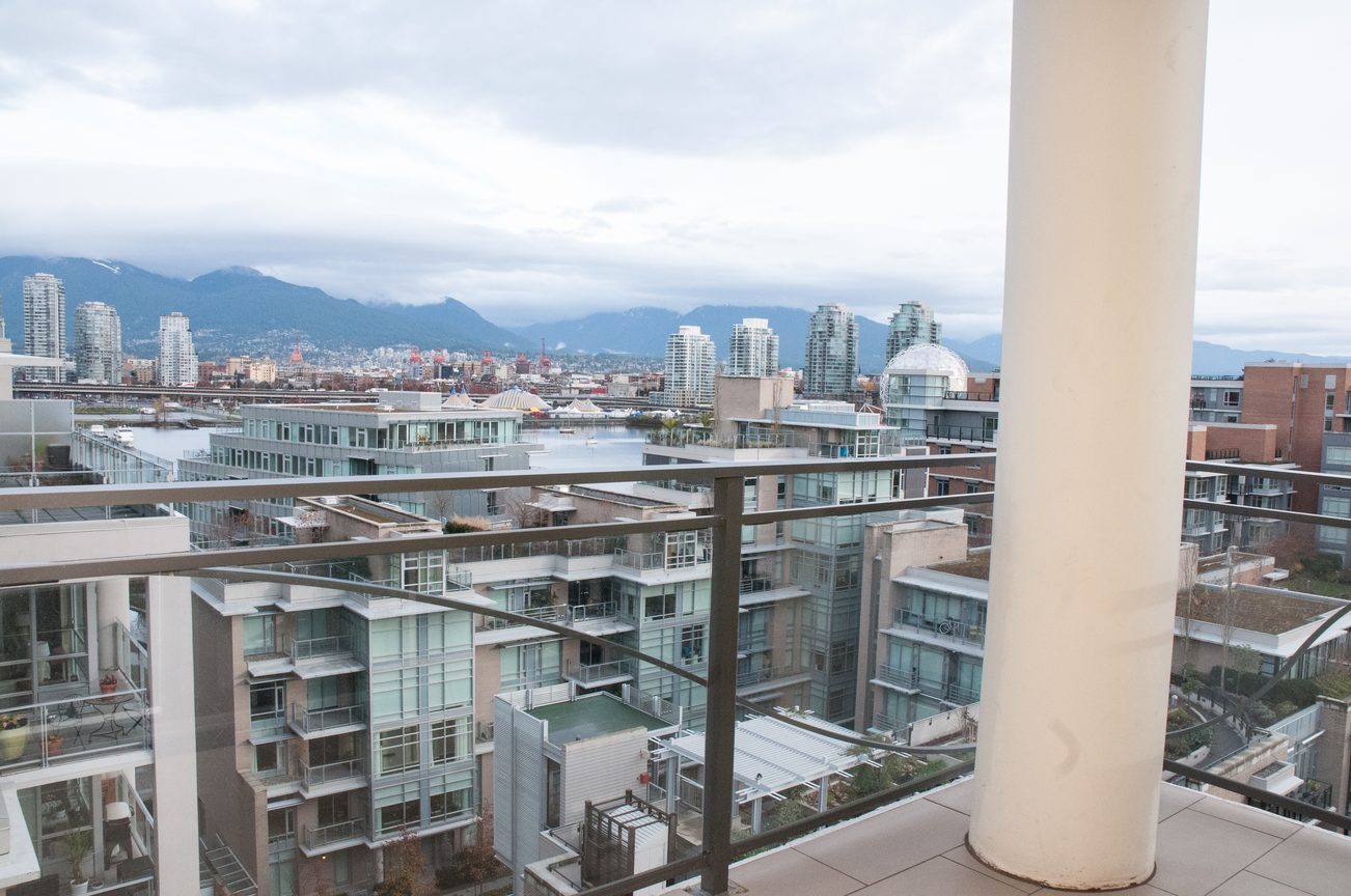 Bright balcony with stunning city view and modern furnishings. - 1010-181 West 1st Avenue, Vancouver West Side
