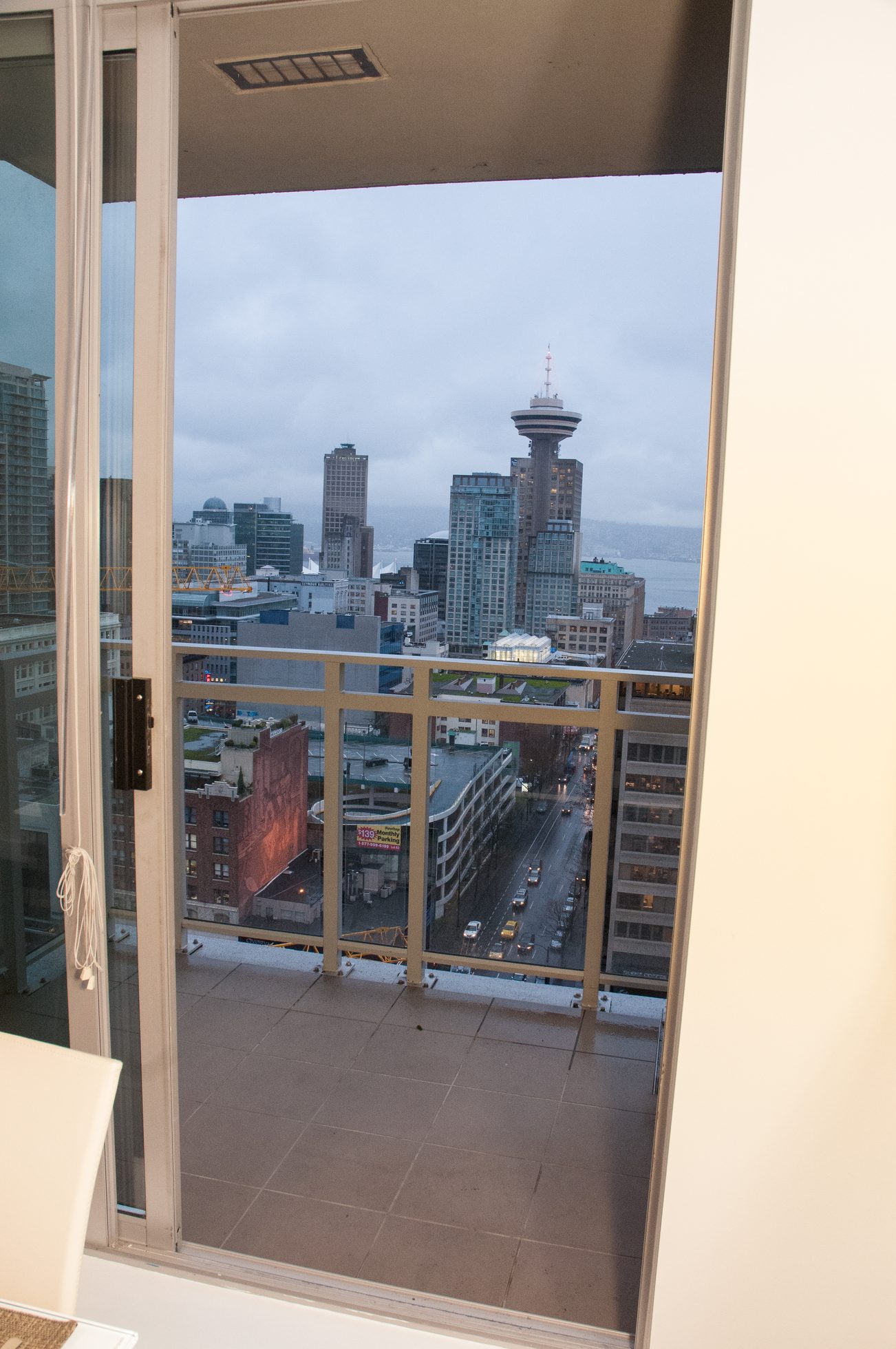 Bright balcony with city view and modern furnishings. - 2306-788 Richards, Vancouver Downtown