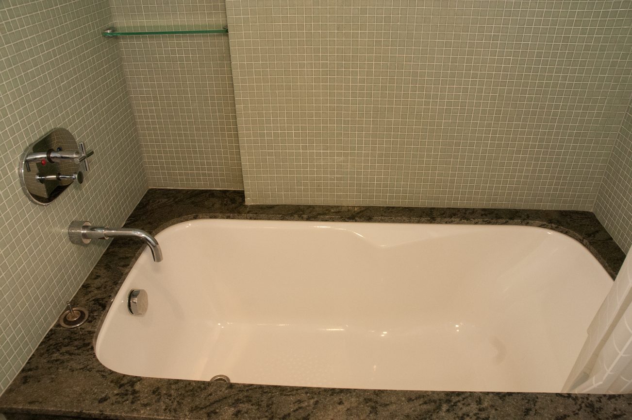 Bathroom with granite countertop and wall-mounted faucet. - 3201 - 1077 Cordova Street W, Vancouver Downtown