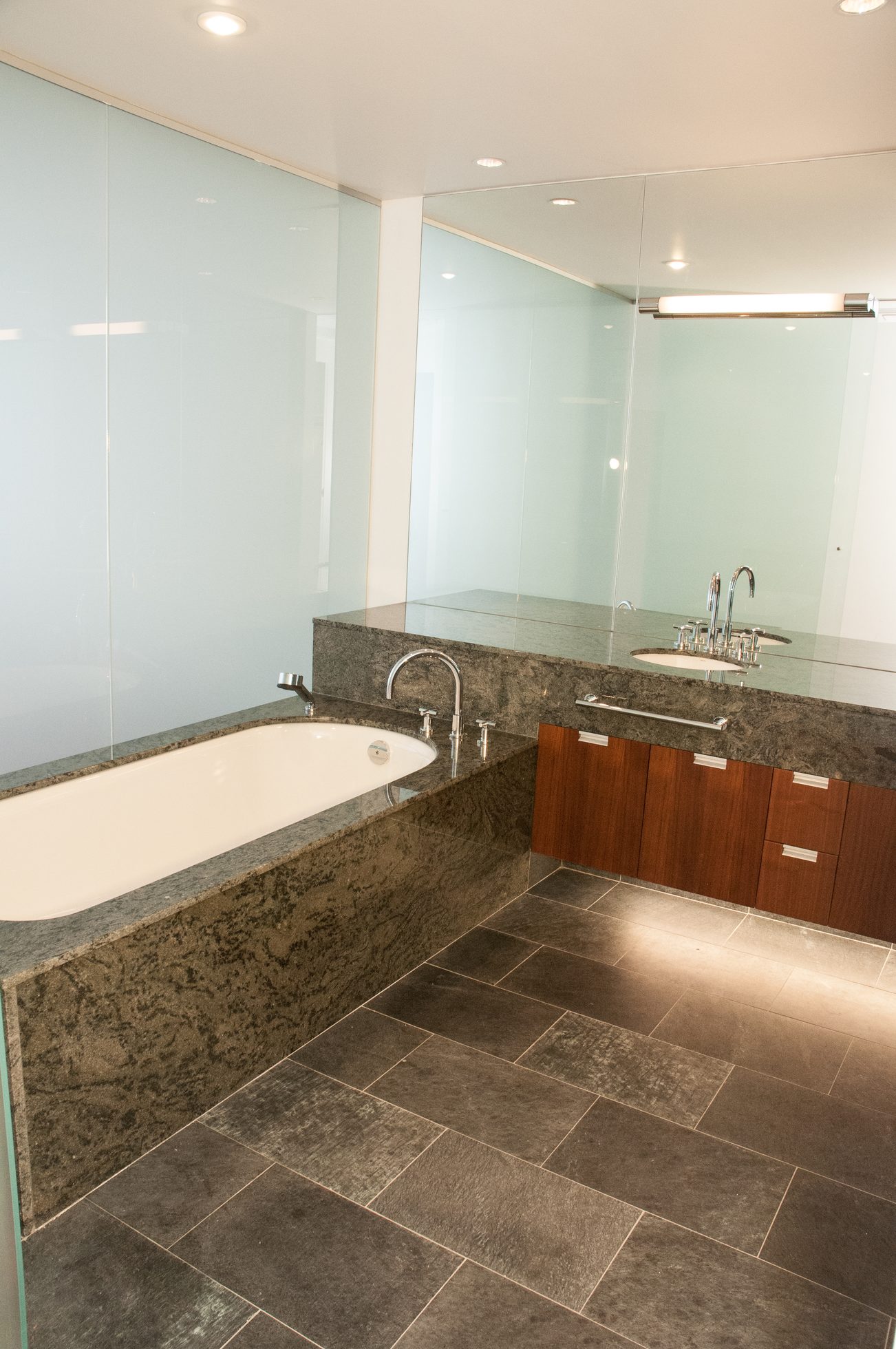 Spacious bathroom with marble countertops and a modern bathtub. - 3201 - 1077 Cordova Street W, Vancouver Downtown