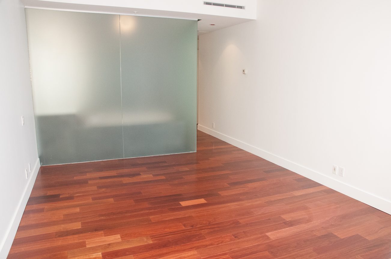 Bright living room with frosted glass partition and hardwood floors. - 3201 - 1077 Cordova Street W, Vancouver Downtown