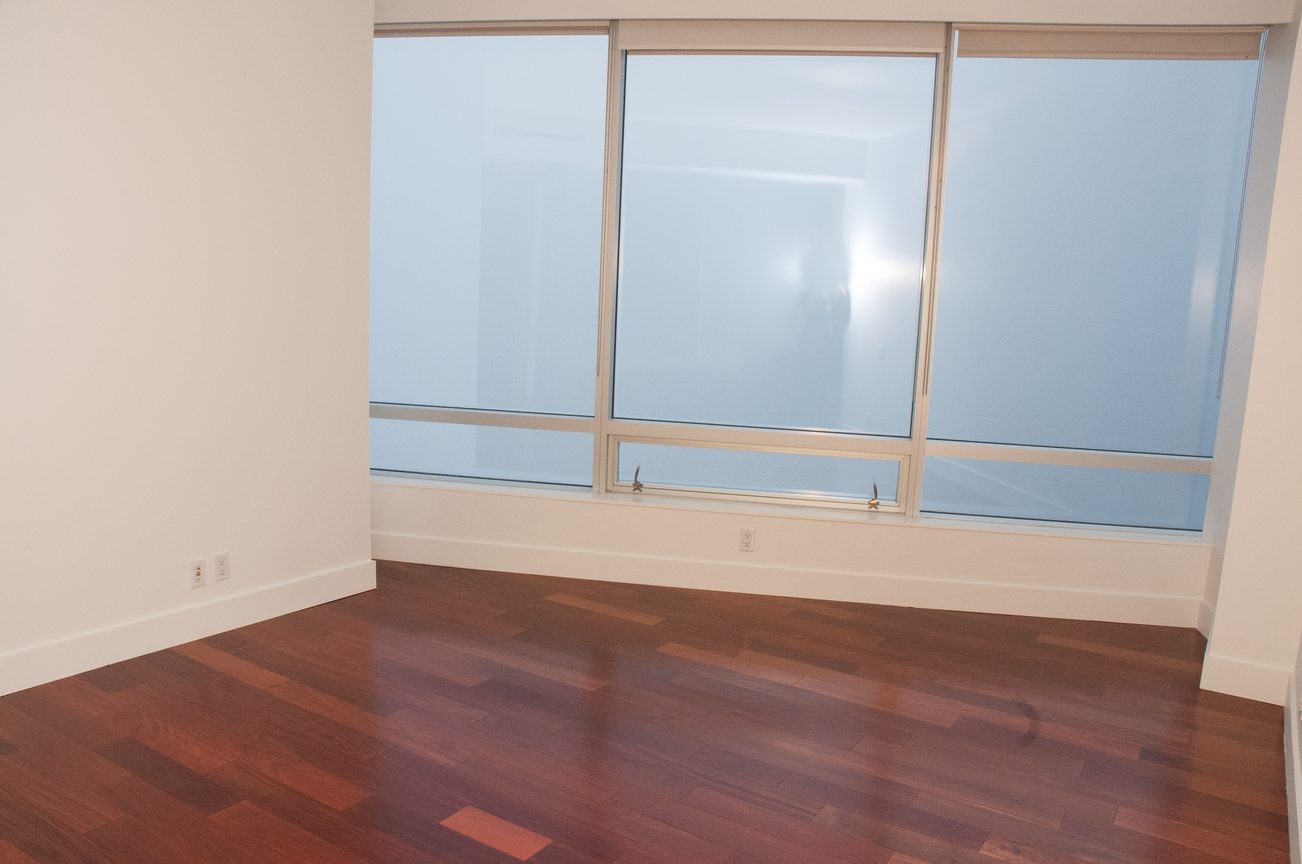 Bright living room with large windows and hardwood floors. - 3201 - 1077 Cordova Street W, Vancouver Downtown