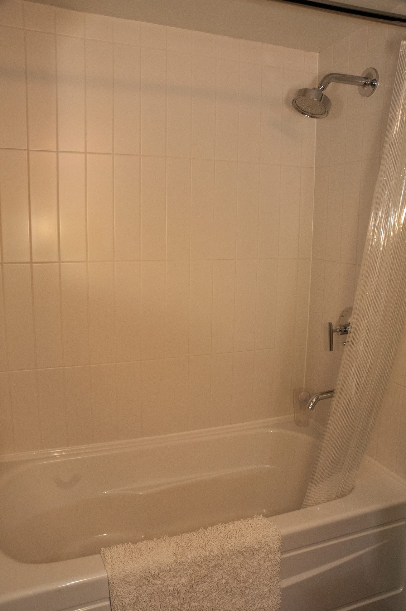 Bathroom with bathtub, shower, and towel rack. - 125- 1863 Stainsbury Ave, Vancouver West Side