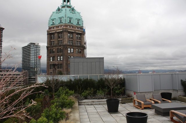 Penthouse with city view, rooftop lounge, and modern furnishings. - 702- 546 Beatty Street, Vancouver Downtown