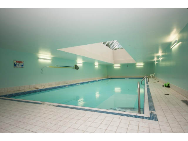 Spacious, modern 1-bedroom + den with a large, well-lit pool area and tiled flooring. - 2901 - 1199 Marinaside, Vancouver Downtown