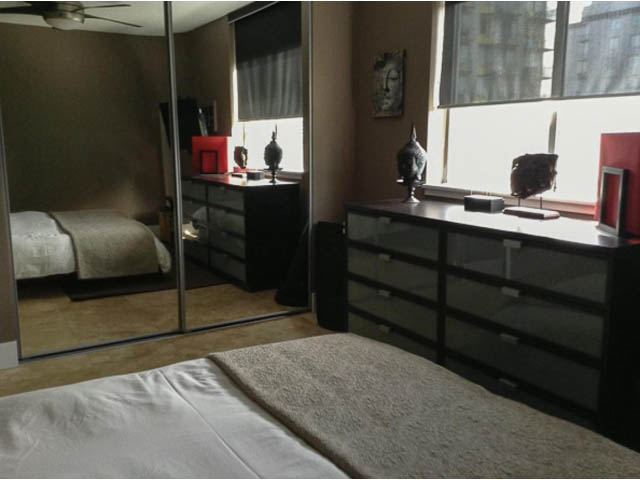 Furnished 1-bedroom condo with modern desk, city view, and hardwood floors. - 501 - 1251 Cardero Street, Vancouver Downtown