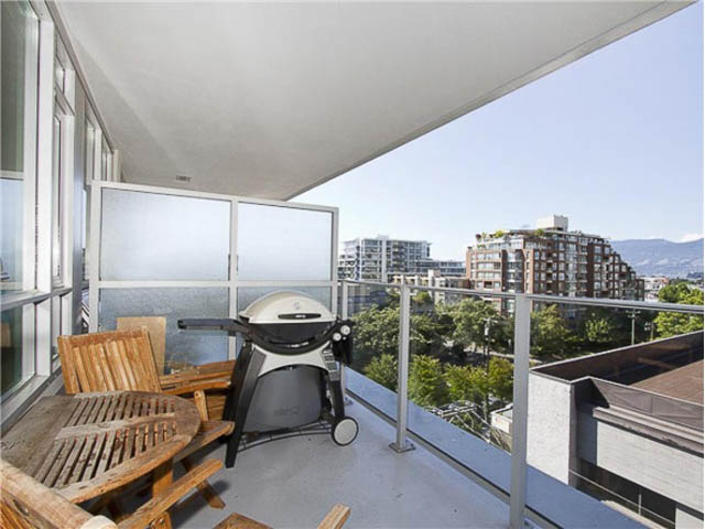 Furnished balcony with city view and outdoor grill. - 508 - 1675 West 8th Ave, Vancouver West Side
