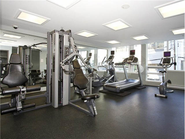 Furnished gym with cardio machines and weight equipment. - 508 - 1675 West 8th Ave, Vancouver West Side