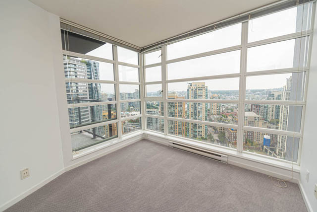 Spacious bedroom with large windows offering stunning city views. - 2504 - 1199 Seymour Street, Vancouver Downtown
