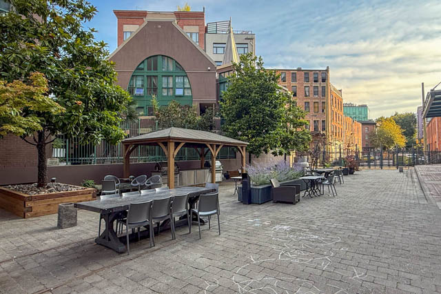 Furnished patio with outdoor seating and a gazebo, perfect for downtown living. - 221 - 55 E. Cordova, Vancouver Downtown