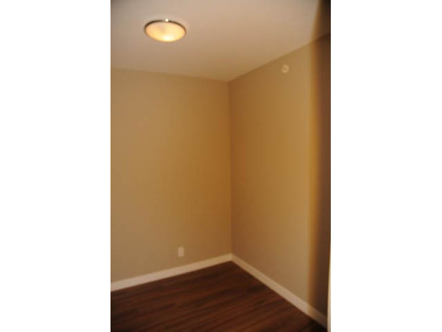 Bright den with hardwood floors and recessed lighting. - 310 - 135 East 17th Street, North Vancouver