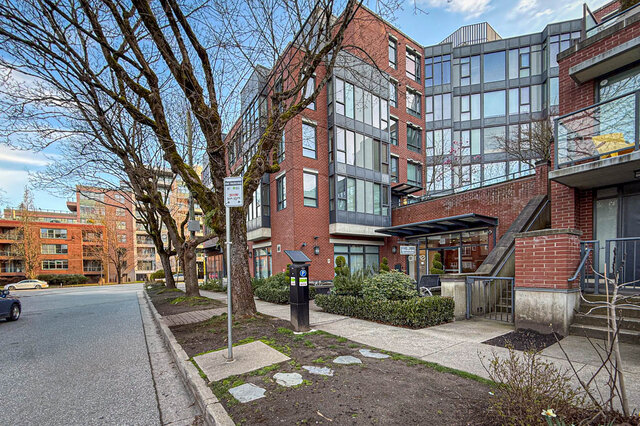 Modern townhouse with brick facade, large windows, and a landscaped entrance. - 3238 Tupper Street, Vancouver West Side